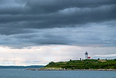 Storm Clouds Lifting Over Tarpaulin Cove Lighthouse on Island